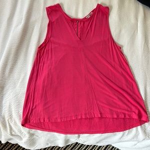 Pink sleeveless blouse with cut out